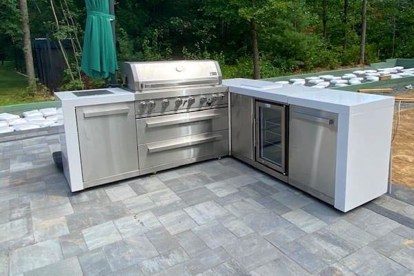 Mont Alpi stainless steel modular outdoor kitchen island with a gas grill